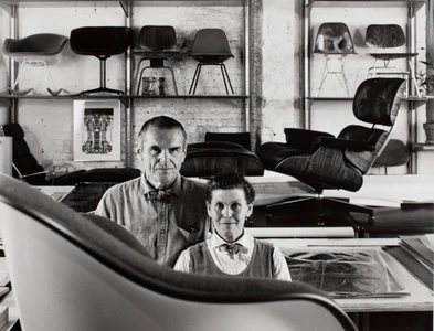 Charles and Ray Eames in their mid-century design studio, surrounded by iconic furniture