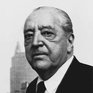 Close-up of Ludwig Mies van der Rohe, showcasing his thoughtful expression and distinctive modernist features.